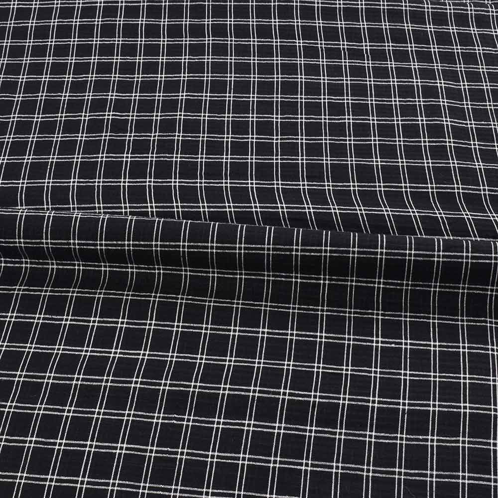 Black Jamdani fabric featuring a classic check pattern