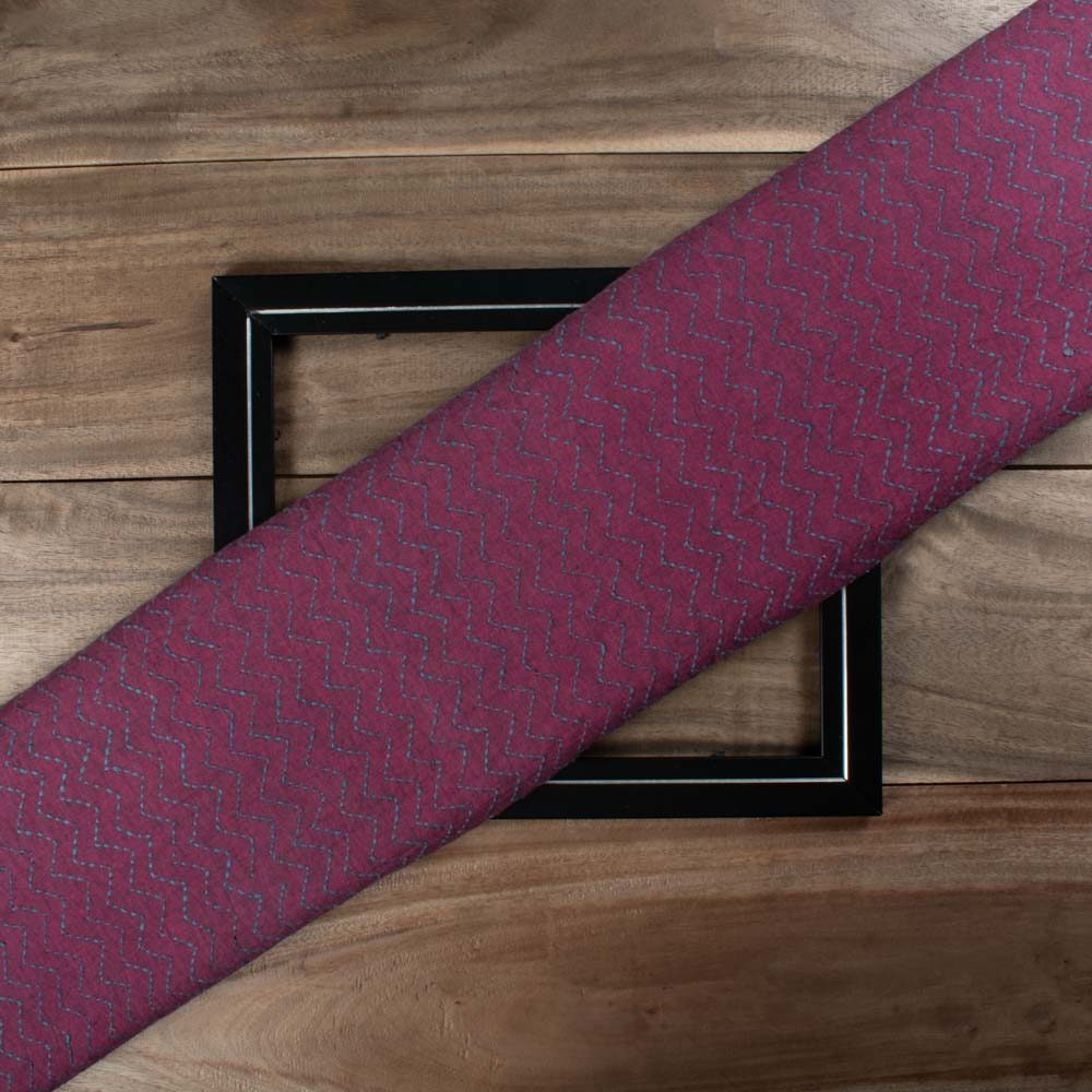 Pure khadi fabric in plum color with Kantha embroidery featuring a zigzag pattern