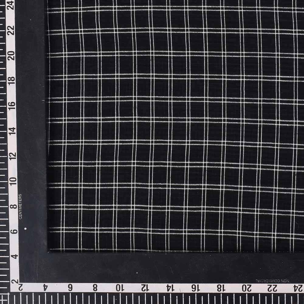 Black Jamdani fabric featuring a classic check pattern