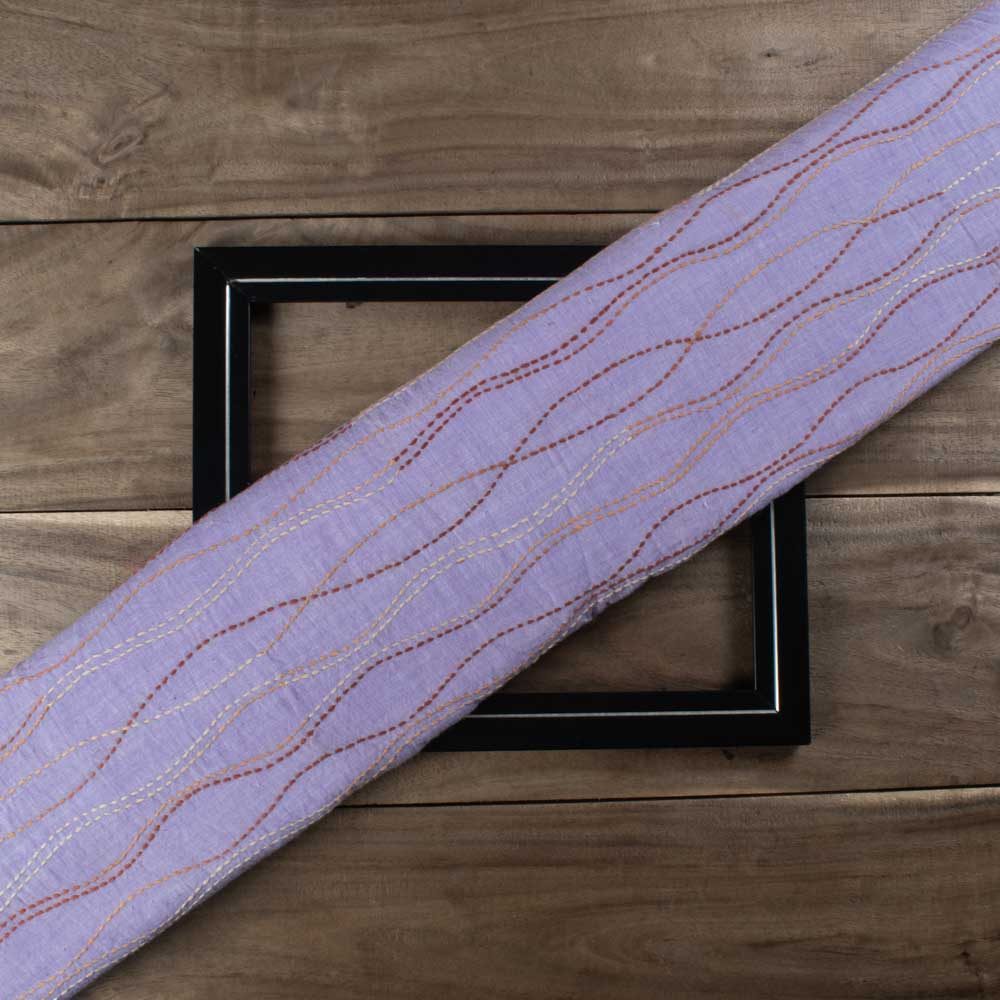 Khadi cotton fabric featuring intricate Kantha embroidery