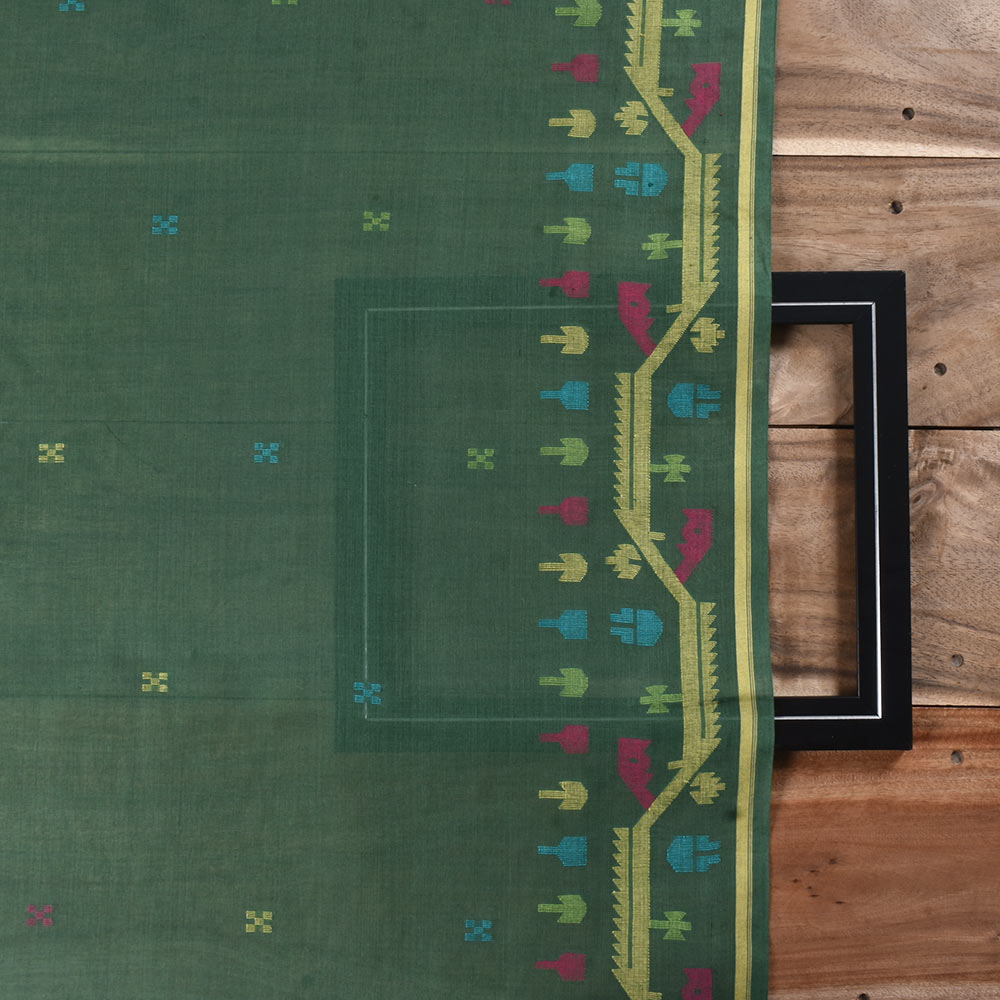 Vibrant green Jamdani fabric featuring a bold geometric pattern