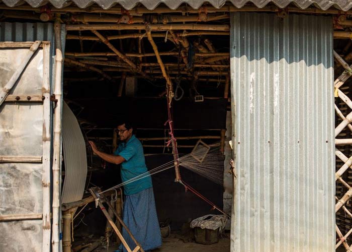 Handloom Weaver Working on Loom