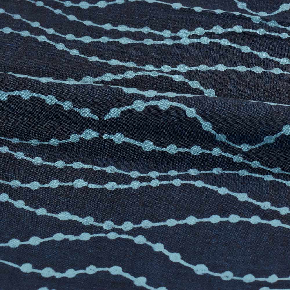 ABSTRACT BLUE DISCHARGE BLOCK PRINTED PURE COTTON 89 GSM HANDWOVEN FABRIC