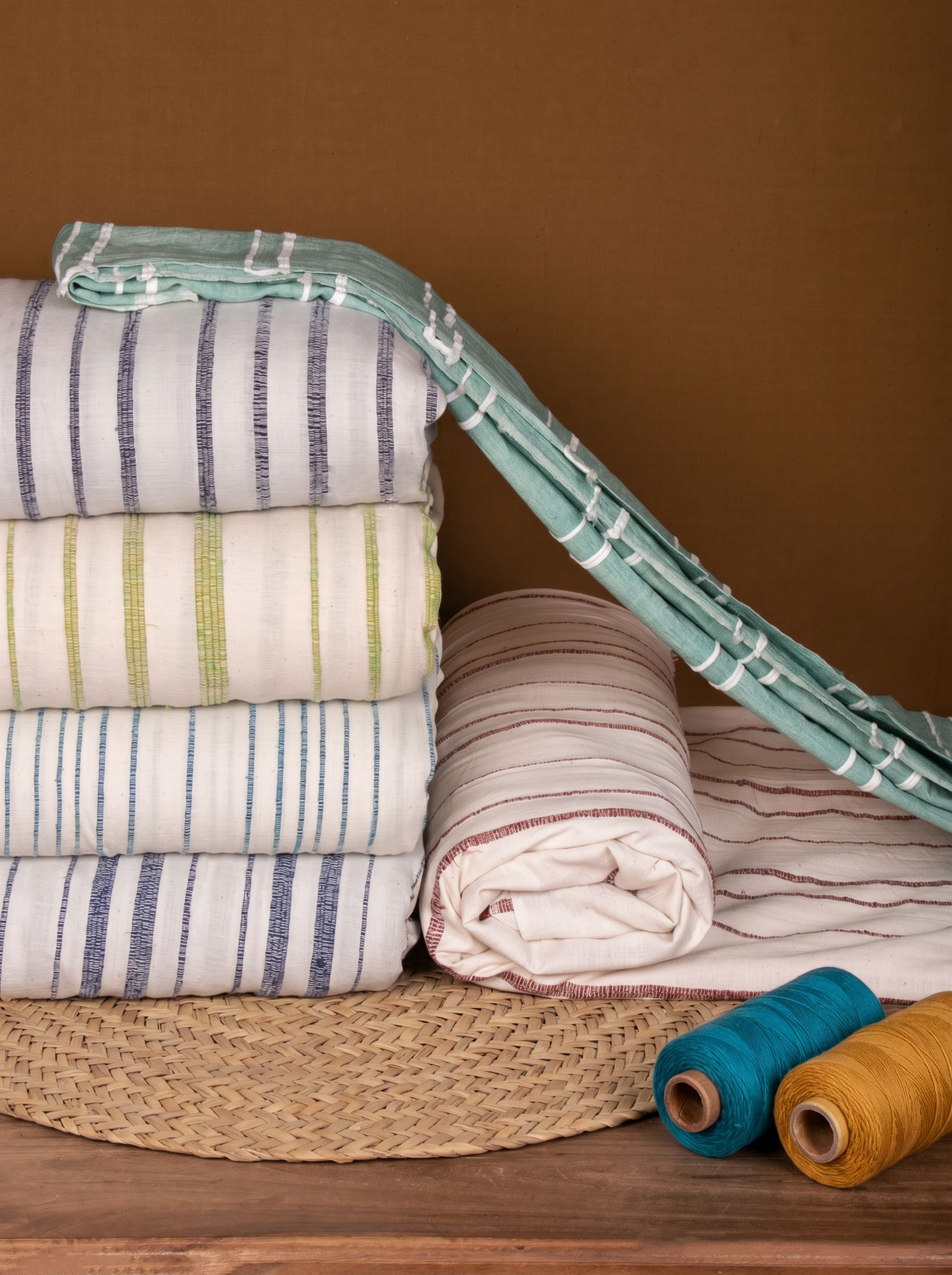 West Bengal artisan weaving Khesh fabric to support sustainable livelihoods and slow fashion