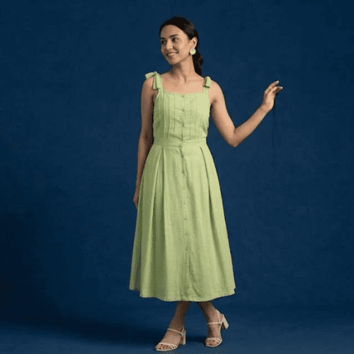 Woman wearing pintucked handwoven cotton festive dress