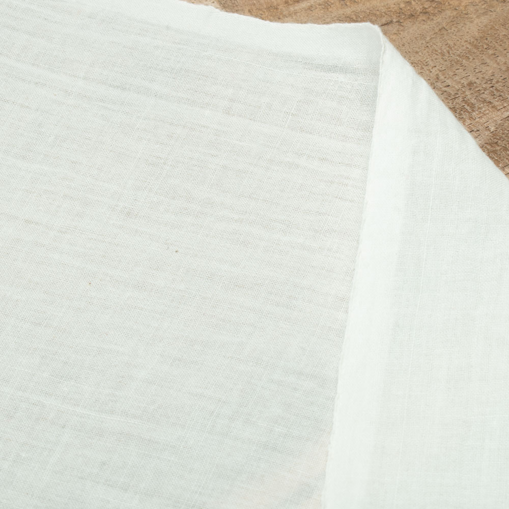 Bleached white RFD Khadi cotton fabric, ready for dyeing and customization.