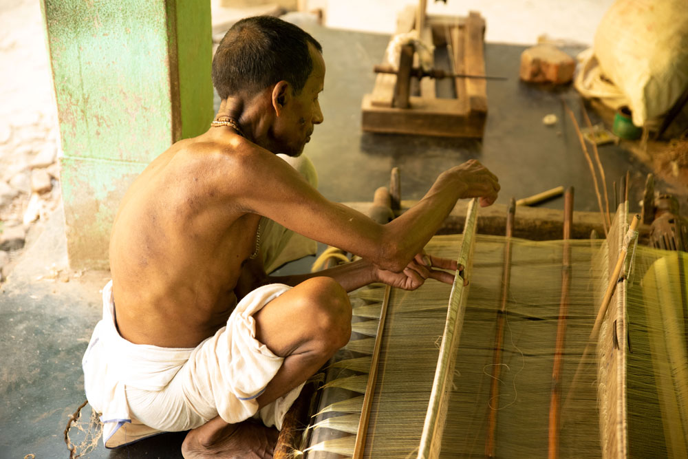 Artisan working on handloom