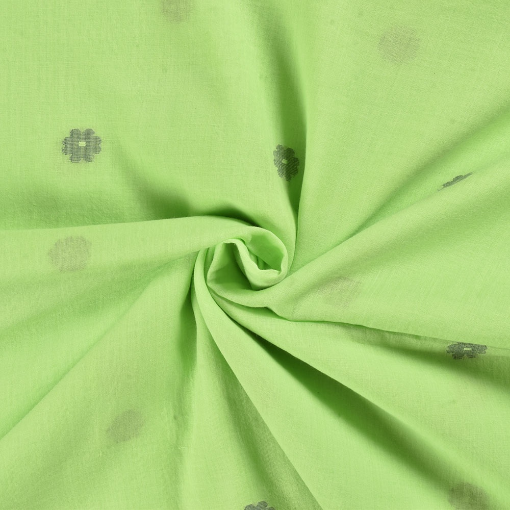 Green Jamdani fabric adorned with a beautiful floral pattern