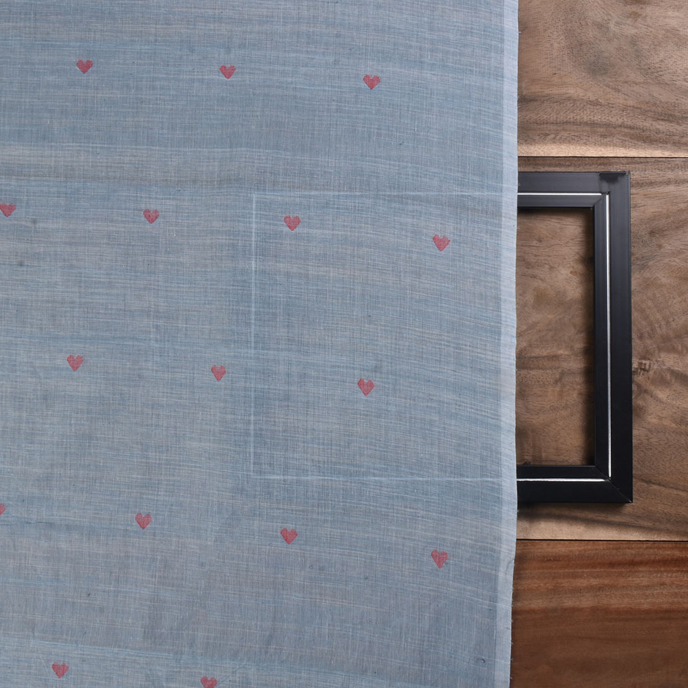 Detailed view of Jamdani fabric with a geometric pattern