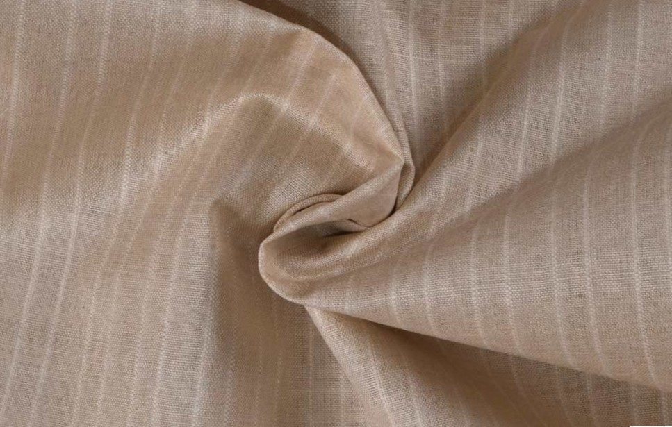 Natural beige Muga silk fabric with a lightweight woven texture and soft drape