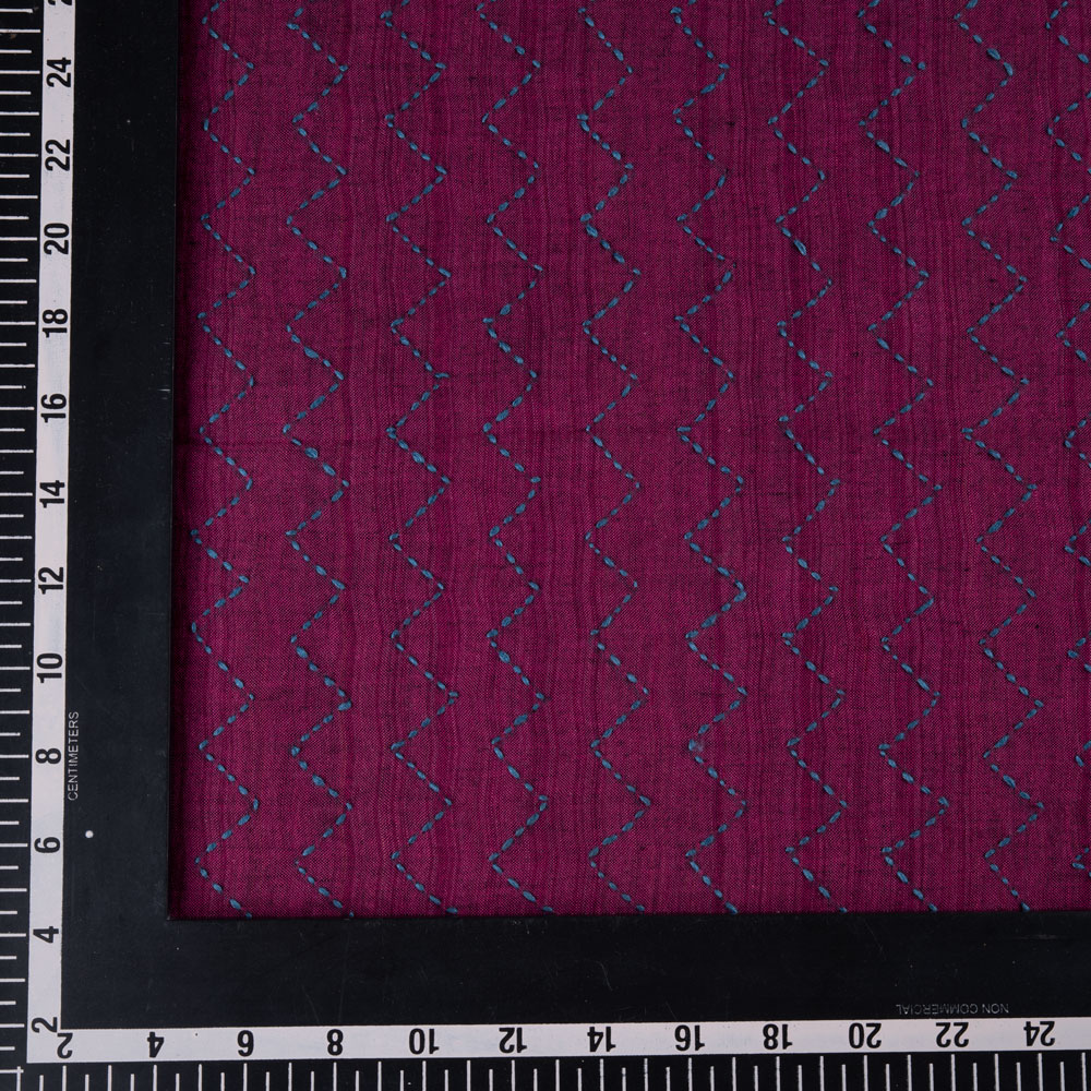 Pure khadi fabric in plum color with Kantha embroidery featuring a zigzag pattern