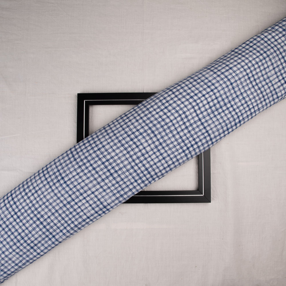Navy and white tie-dye fabric with a check pattern
