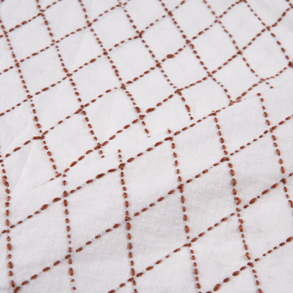 Khadi cotton fabric with Kantha embroidery in a diamond pattern