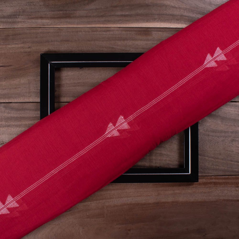 Red plain cotton Jamdani fabric with white arrow motif folded for product display