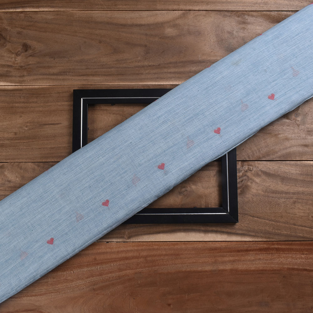 Blue Jamdani fabric featuring a geometric pattern in fine detail.