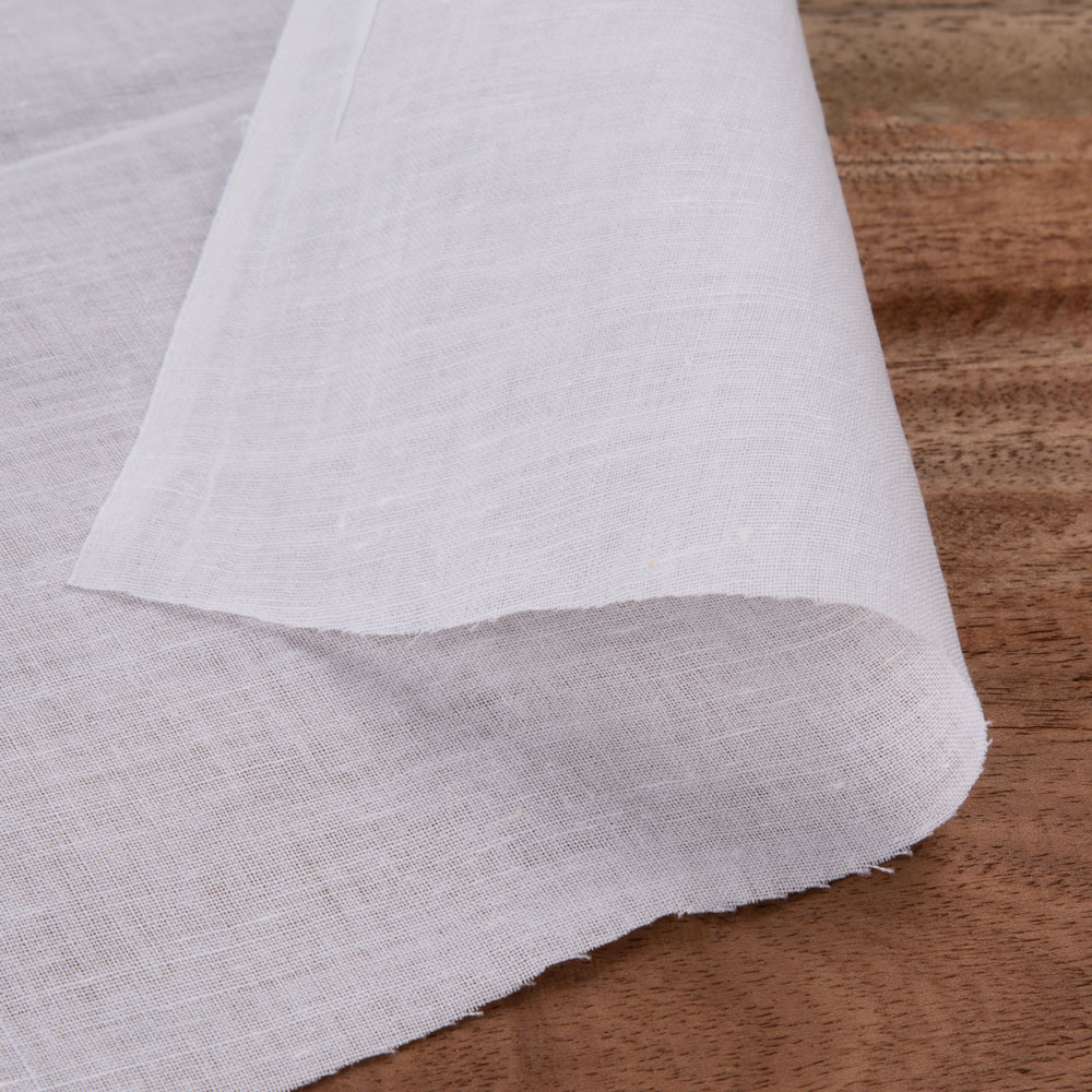 White bleached Khadi cotton fabric, perfect for versatile crafting and custom designs.
