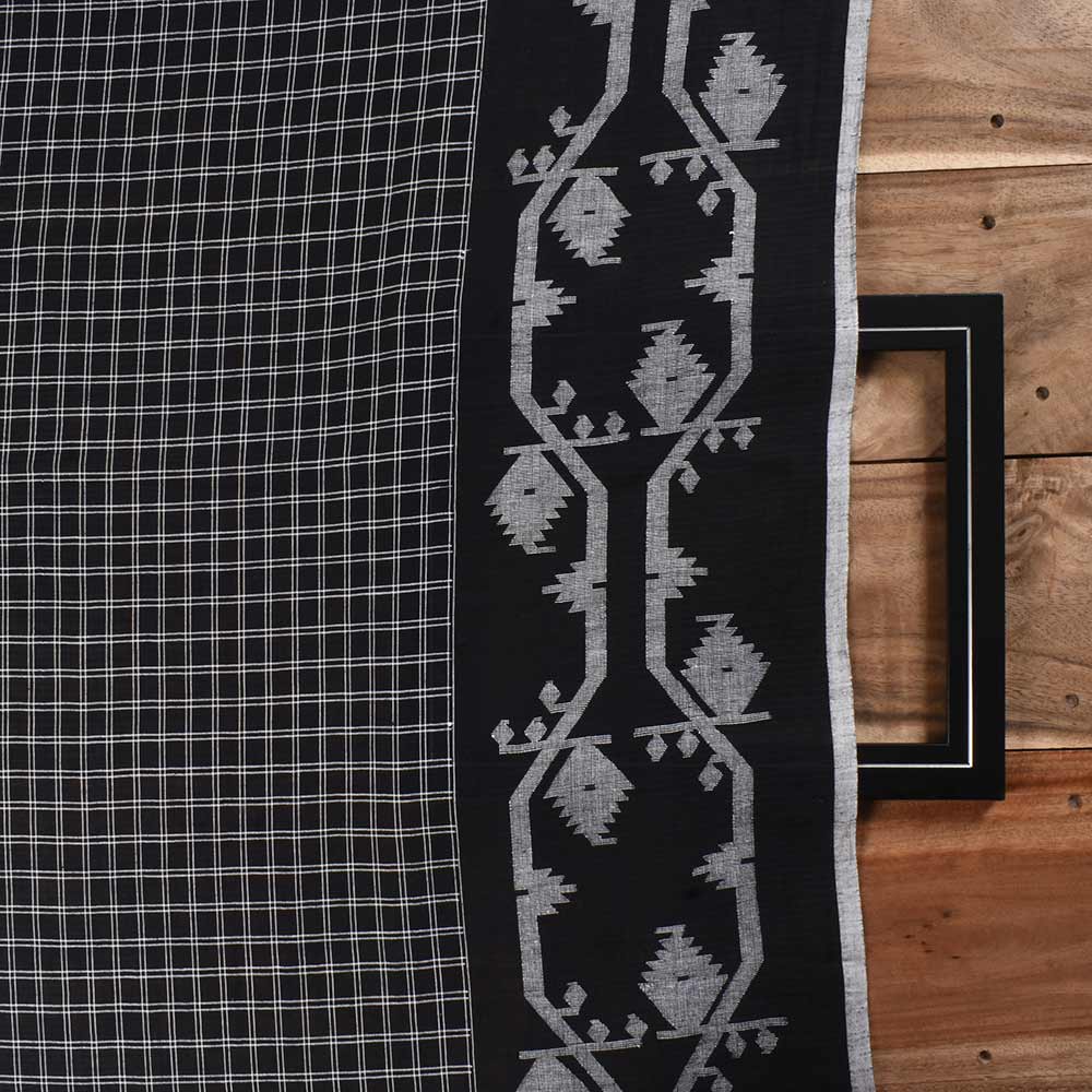 Black Jamdani fabric featuring a classic check pattern