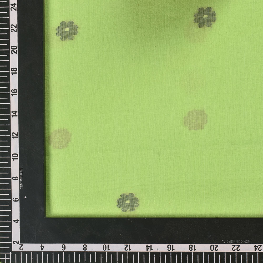 Close-up of Jamdani fabric showcasing its floral patterns.