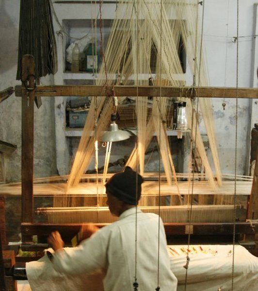 Artisan working on handloom